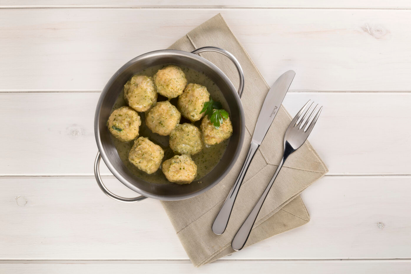 Foto receta albondigas de merluza y pota en salsa verde
