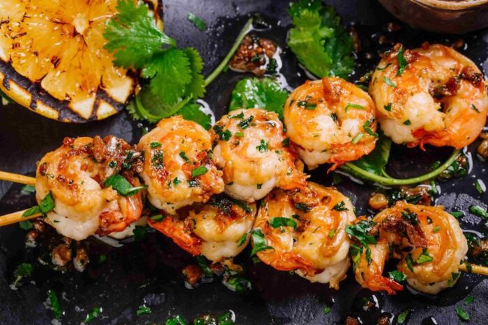 Foto formación brocheta de langostinos a la brasa fish solutions