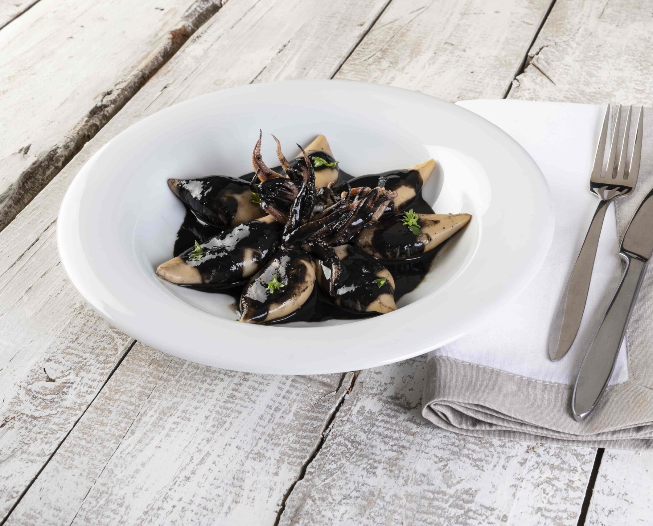 Calamares en su tinta fish solutions para hosteleria