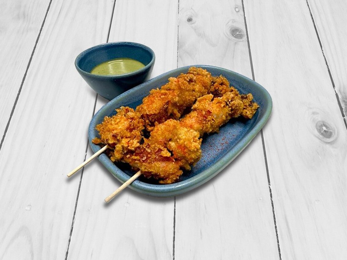 Foto receta de brocheta de pulpo con mojo verde y aguacate